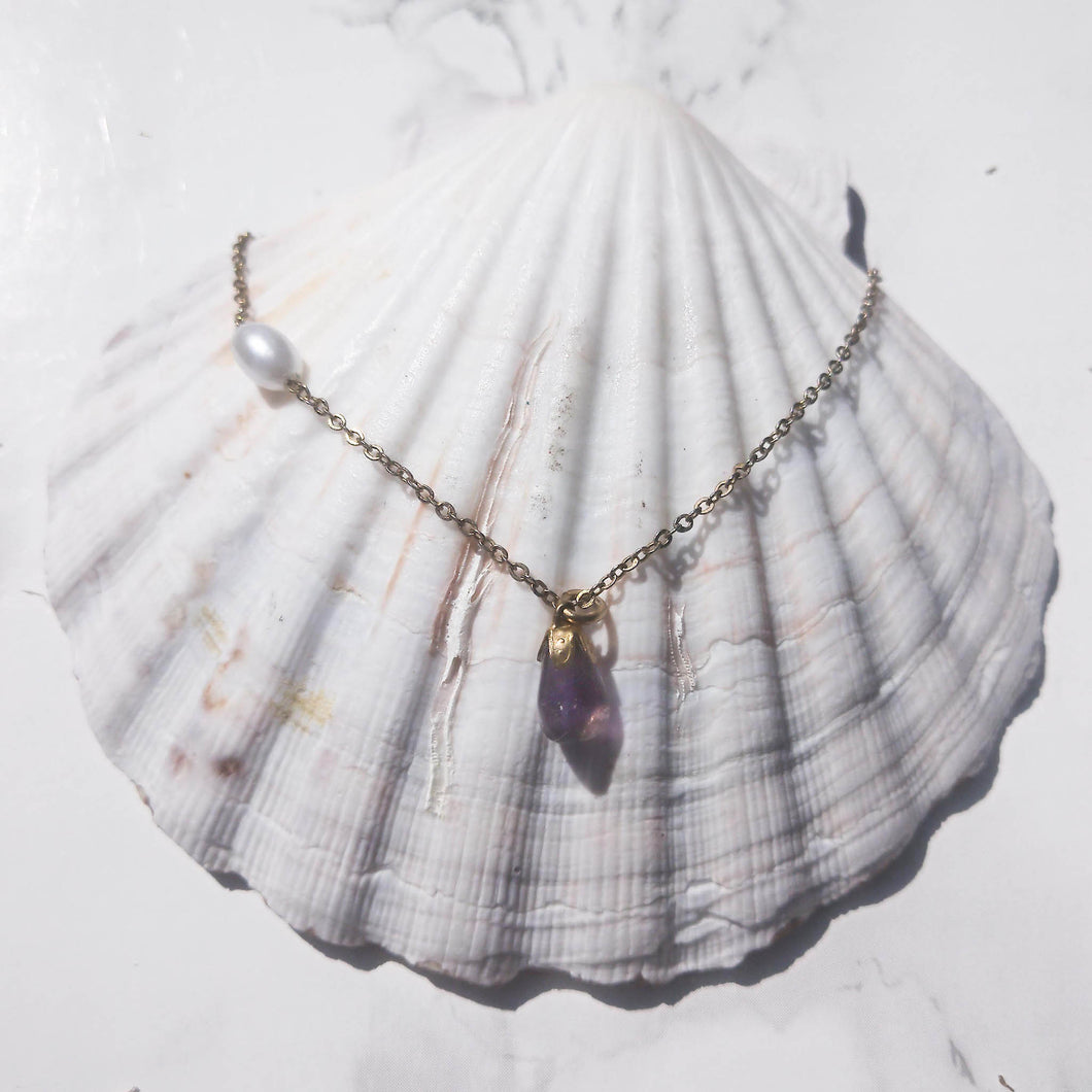 Amethyst and asymmetric pearl style detail 