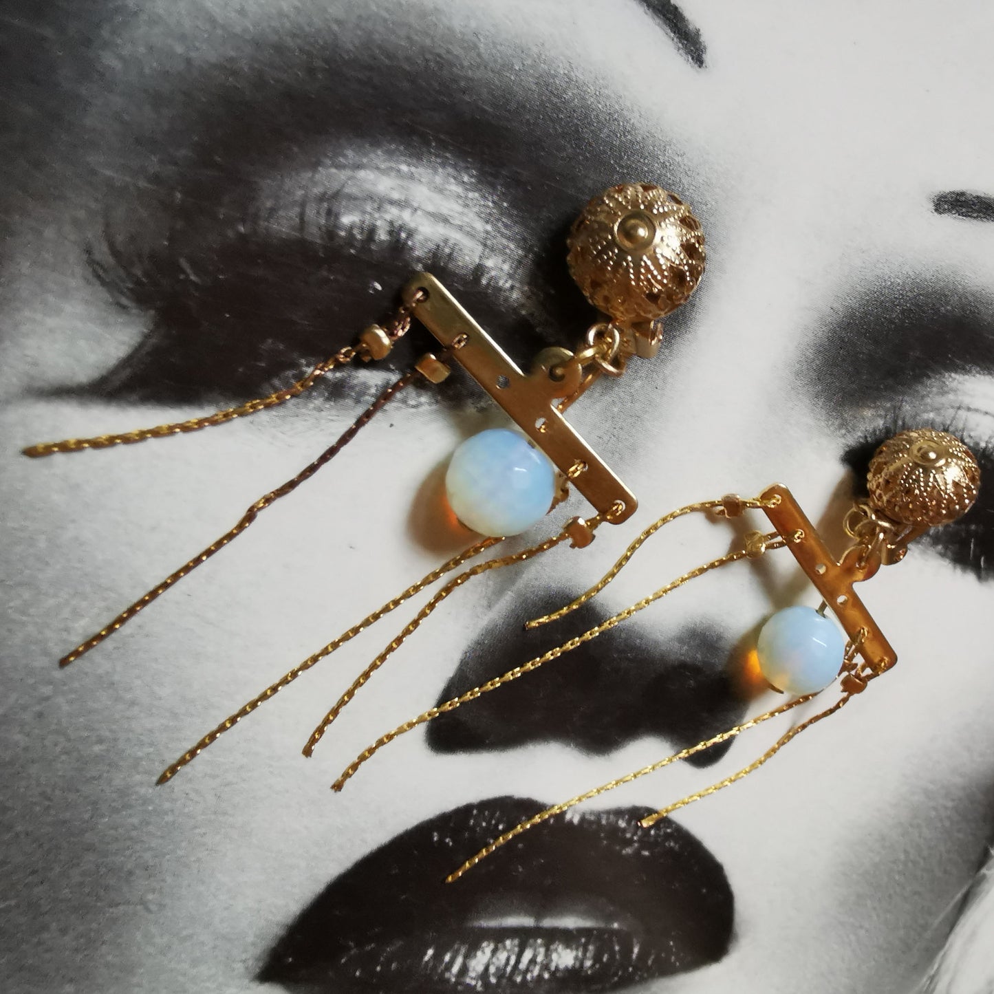 Opal Clip on earrings on magazine fashion metal