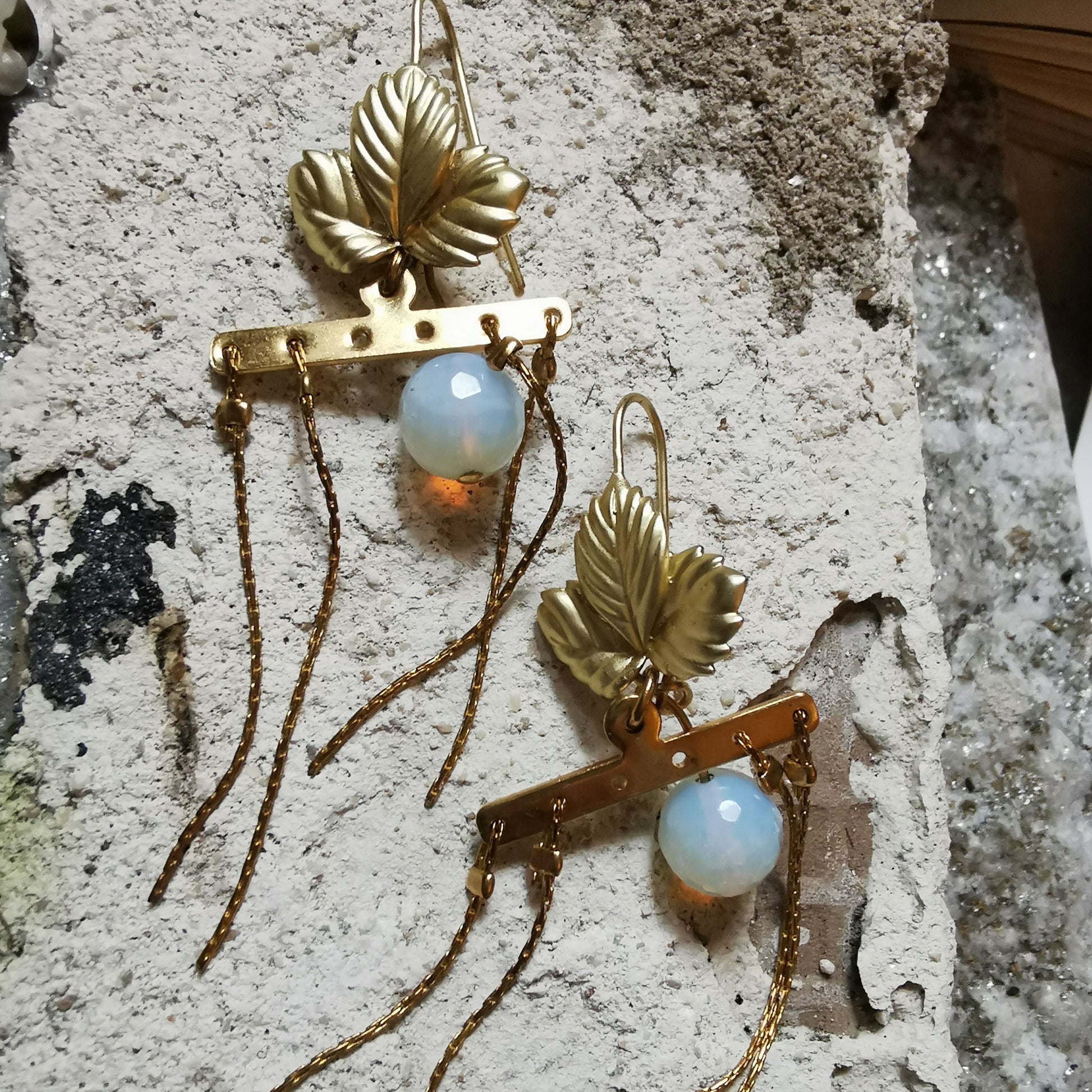 Opal leaf earrings with dangle details on gesso 