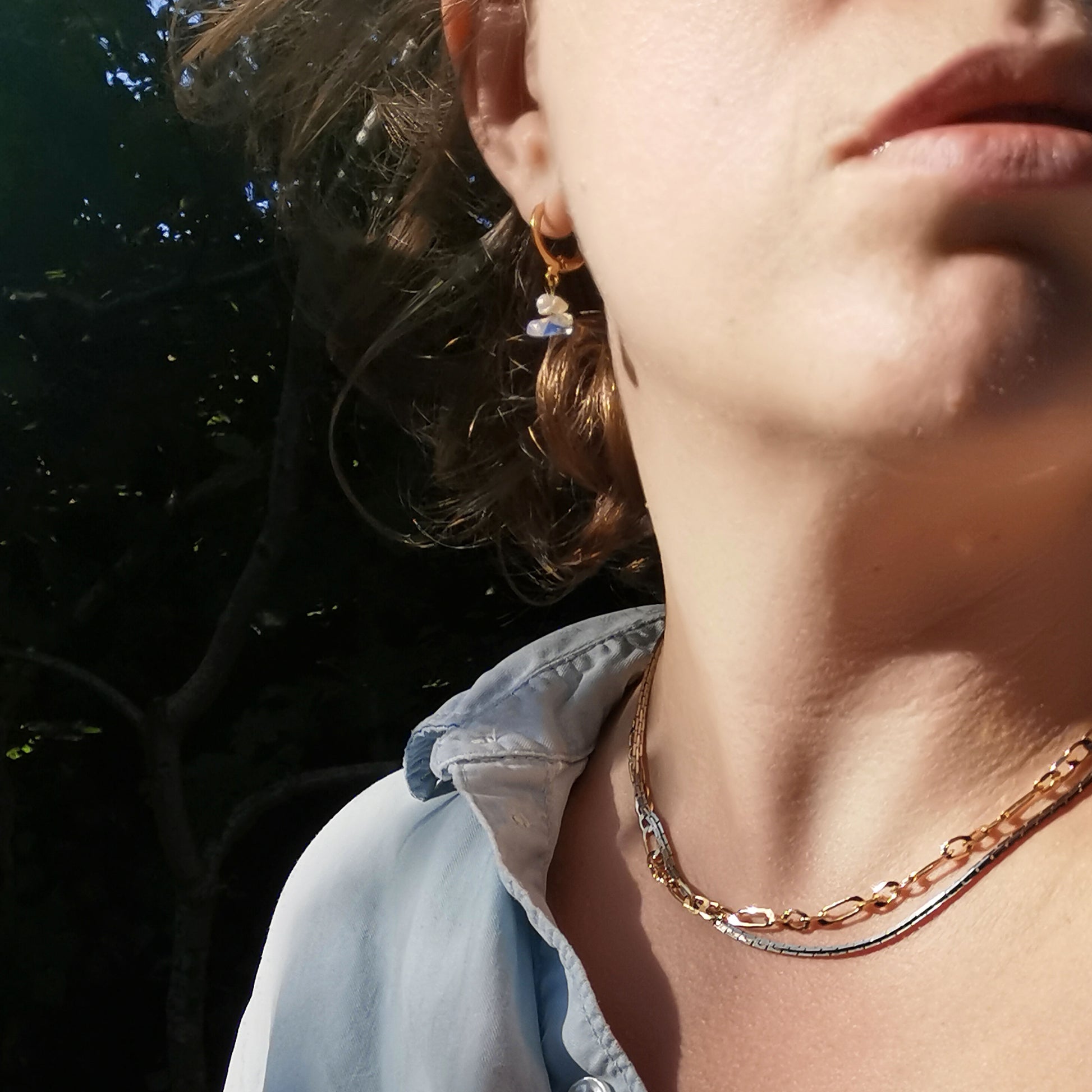 Camifolla Opal cloud mini hoop earrings worn on