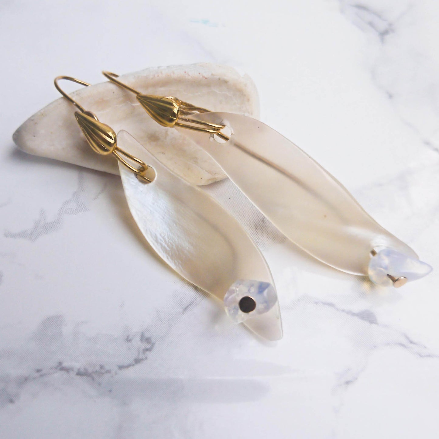 Mother of pearl leaf earrings with opal and leaf hook  details 