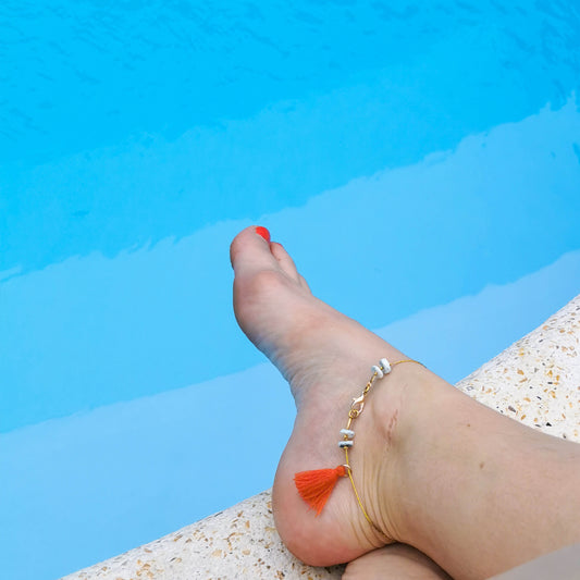 Santorini Anklet worn on (coral tassle and white and blue beads)