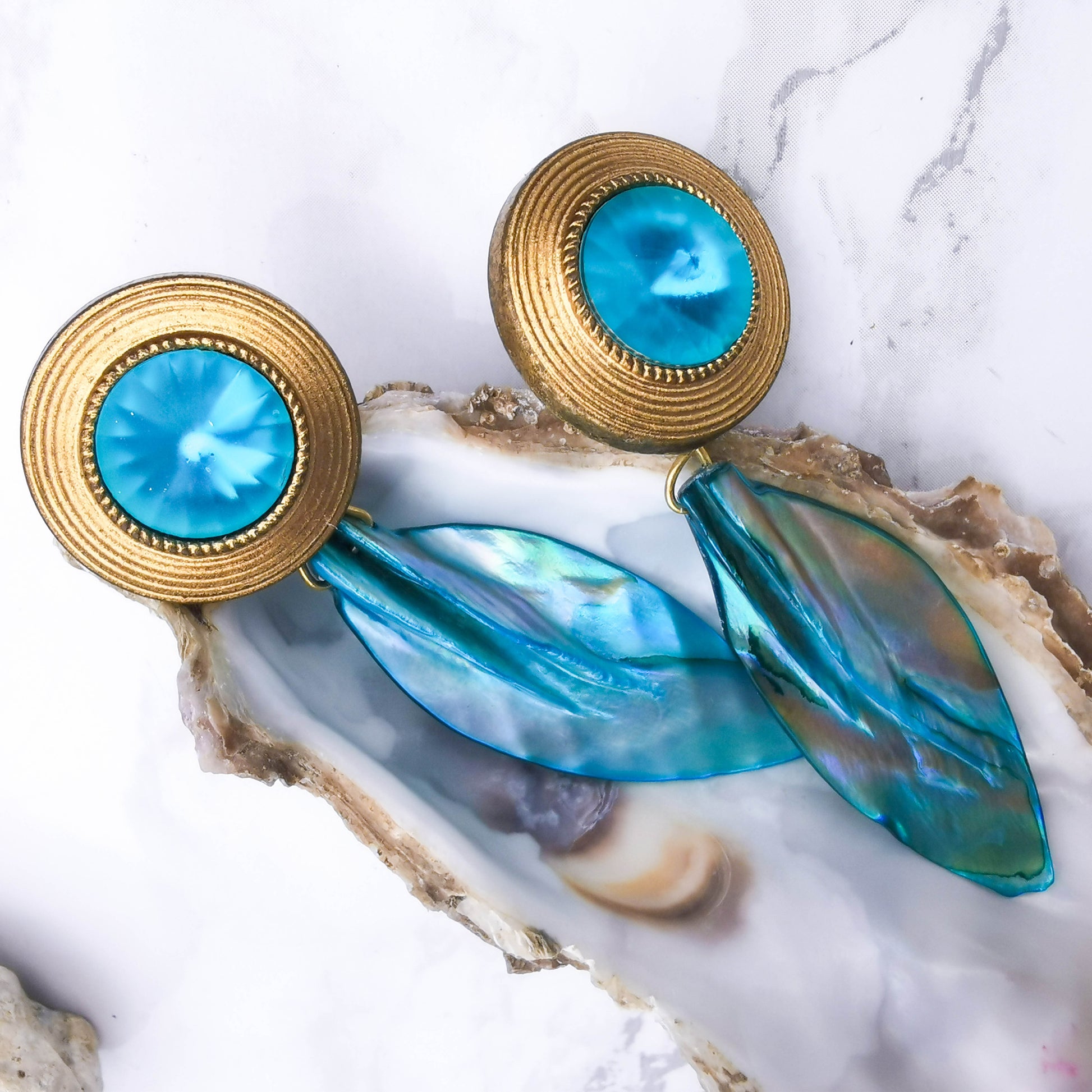 Turquoise stud earrings with dangly shell piece