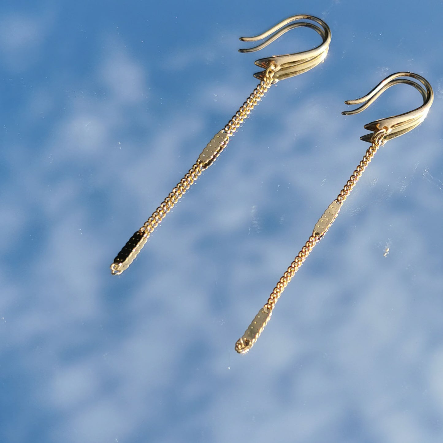 Dangle earrings gold reflection