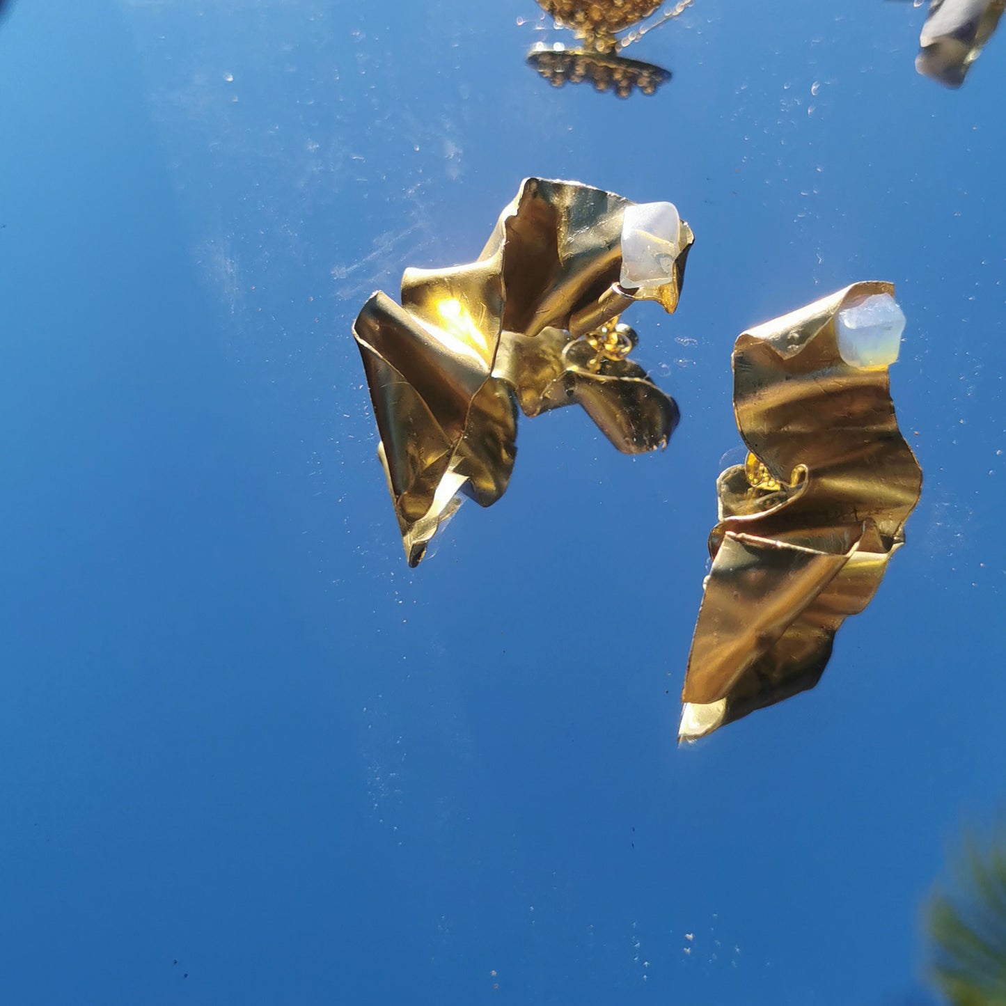 Brass wrapped style earring with mirror