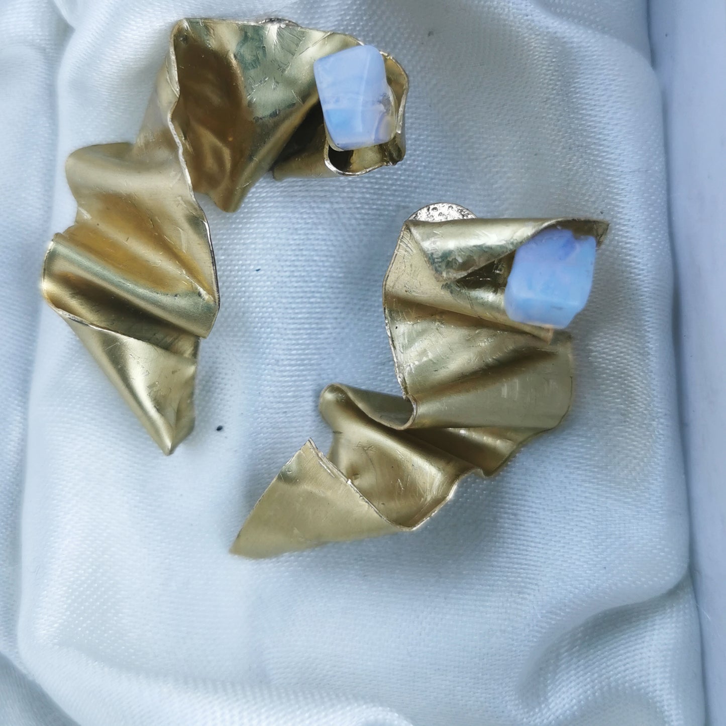 Wrapped earring with opal  on silk