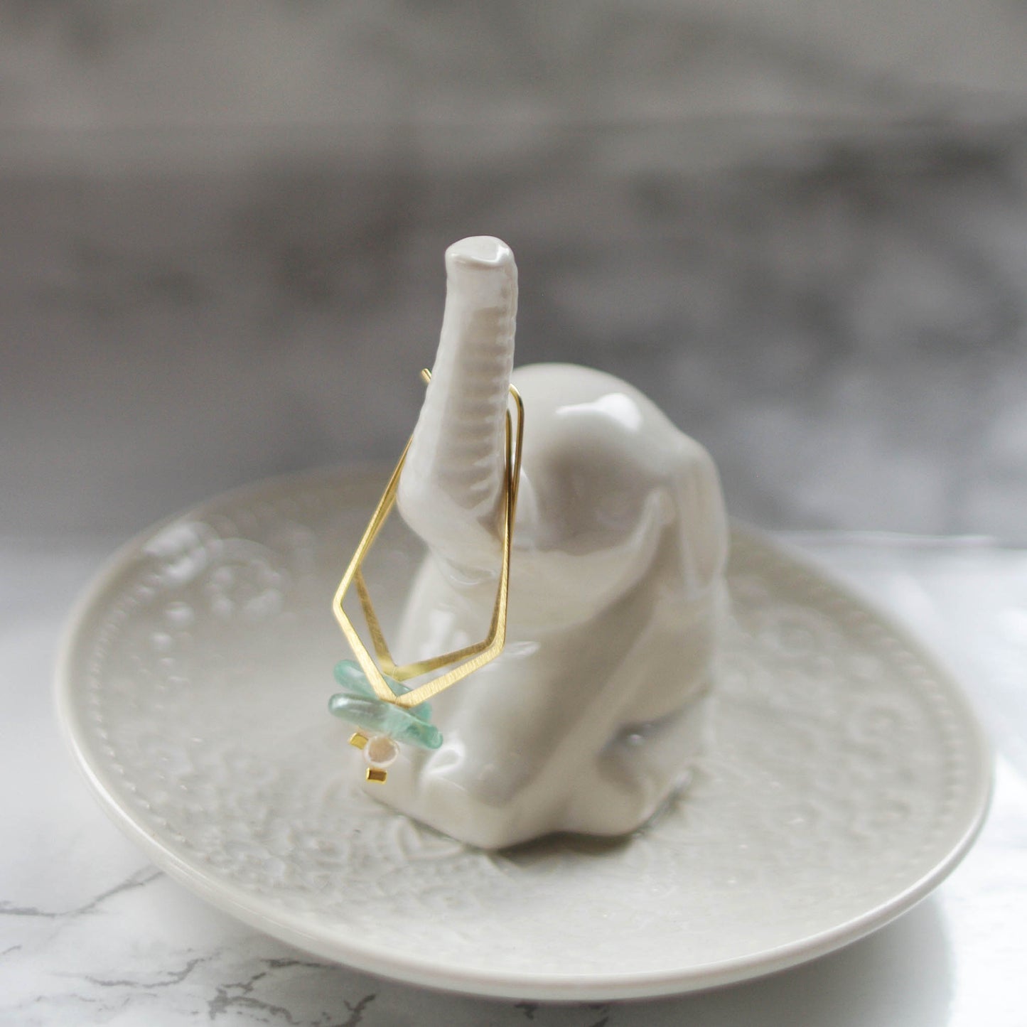 Goldie Earrings with Dimbo the elephant 