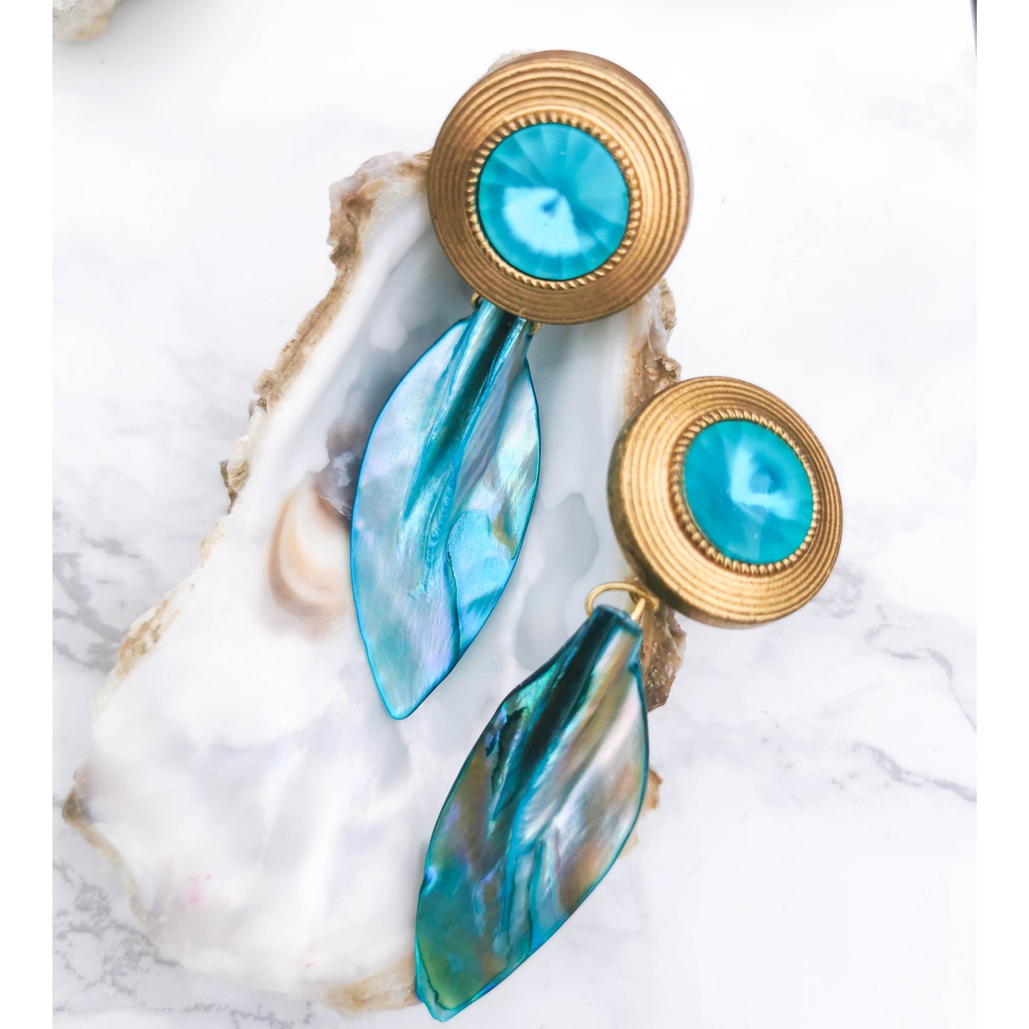 Stud earrings with turquoise detail and turquoise shell dangle