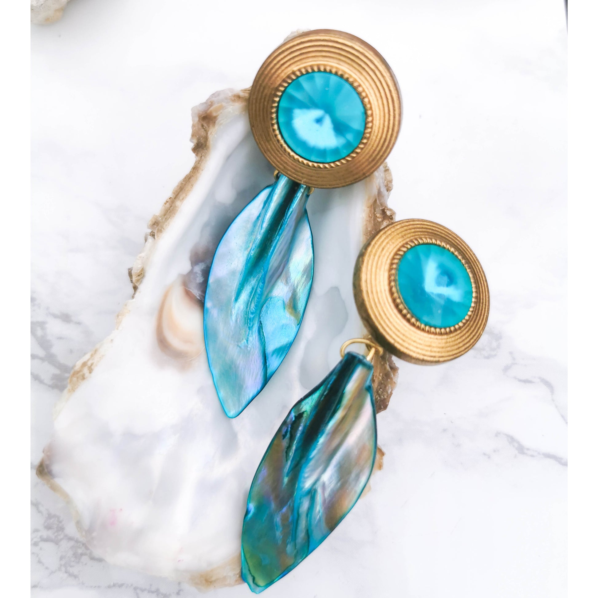Stud earrings with turquoise detail and turquoise shell dangle