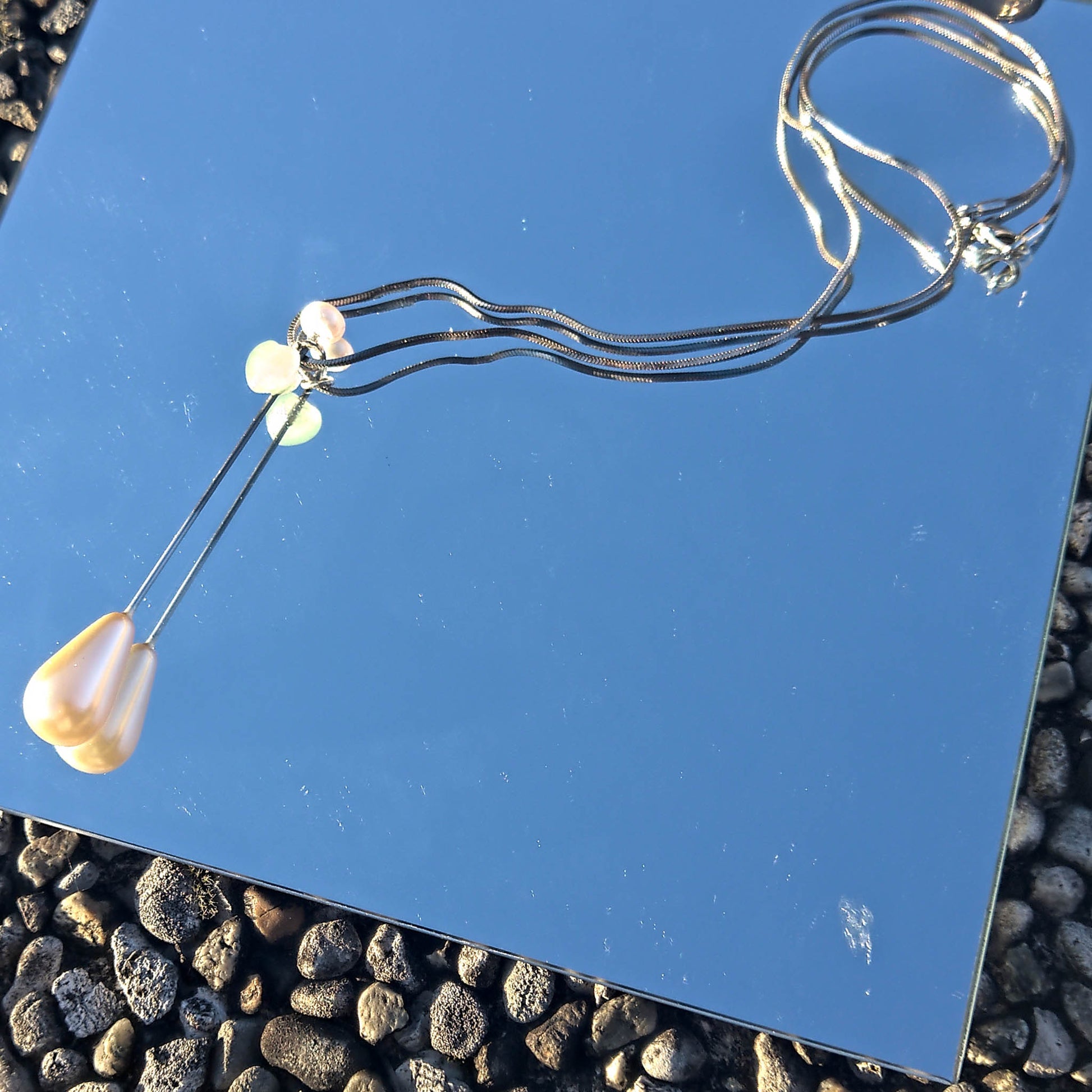 Camifolla Signature Teardrop necklace with pearl pin detail and mint heart and silver chain 